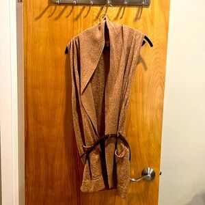 Tan colored knot vest with belt